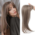 Synthetic wig hairpiece with inner buckle clip for extensions, shown in one of six style colours.