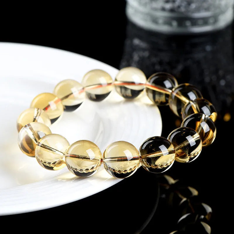 Natural citrine scattered bead bracelet showing polished stones in warm tones
