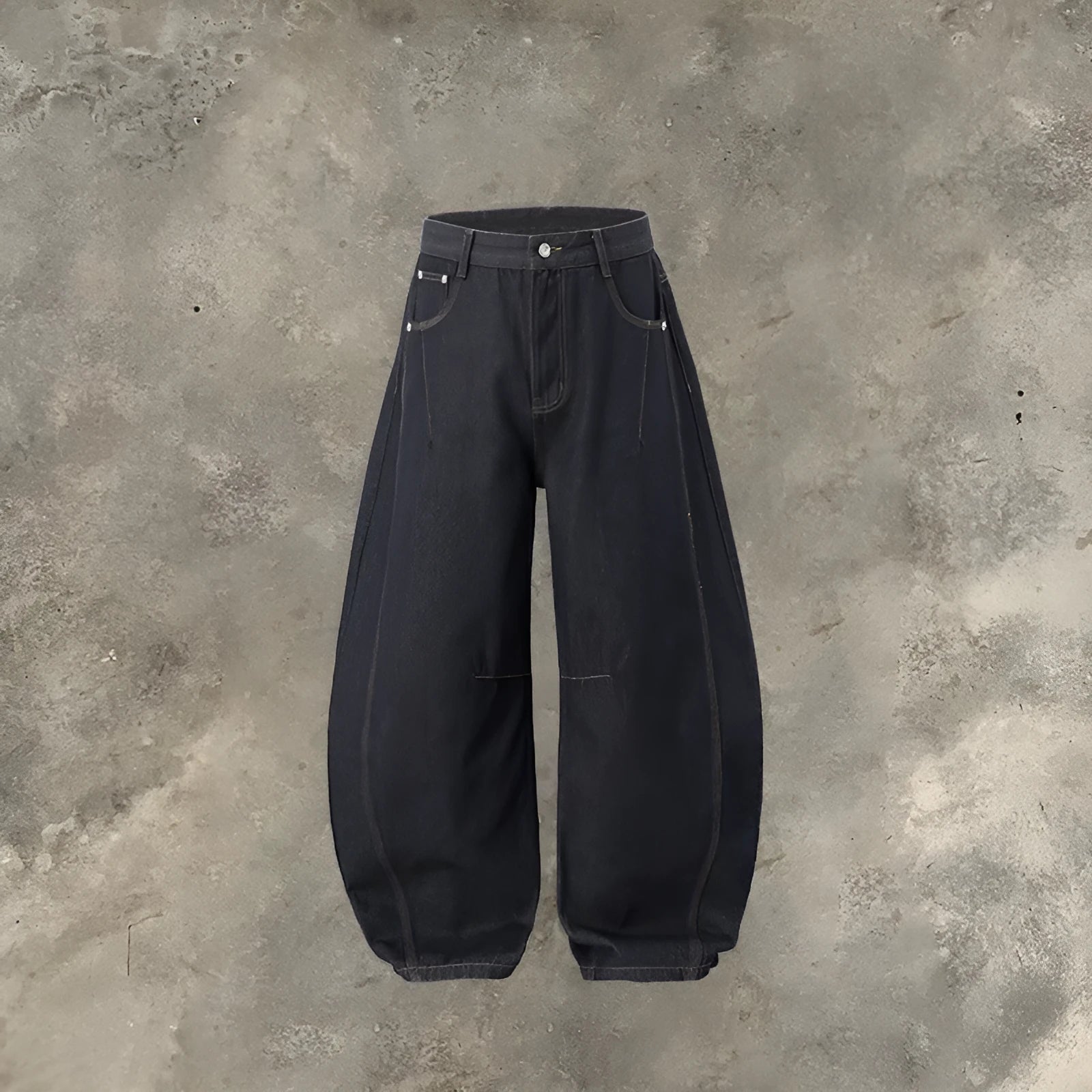 Men's wide leg denim trousers in original cow colour, showing mid waist and loose leg fit.
