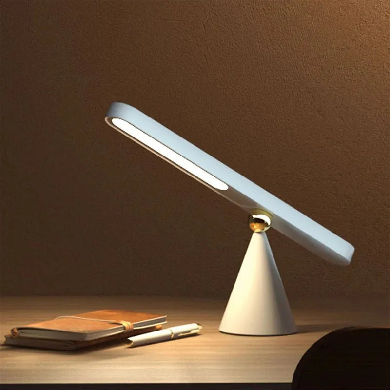 Geometric USB desk lamp with magnetic suction base for wall mounting in white colour