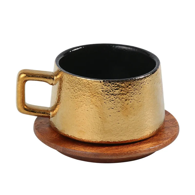 Gold and silver plated gift box next to a 250ml solid colour coffee travel mug.