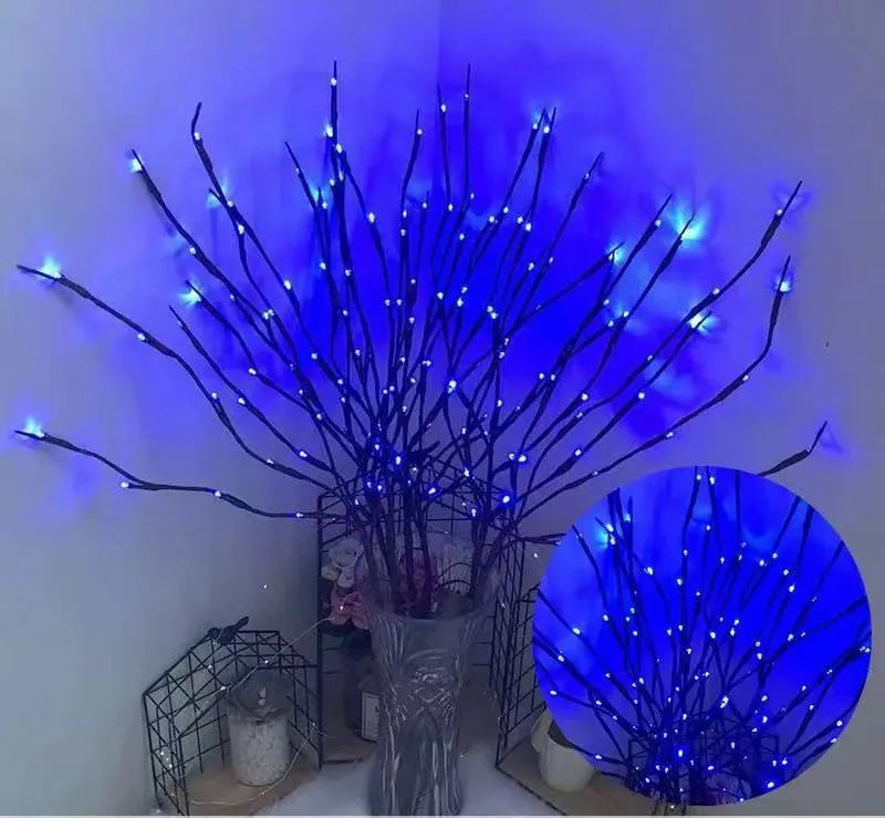 LED decorative tree light with silver branches in vase base, showing multiple colour lighting options