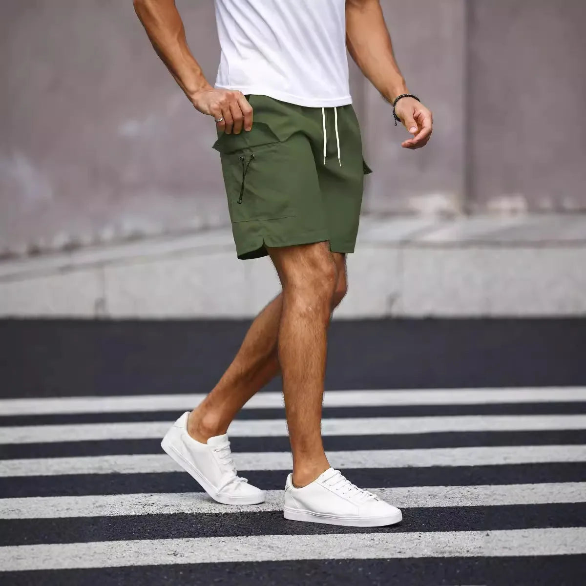 Men's loose-fit workwear shorts in cool silk cotton fabric available in fluorescent green and army green colours