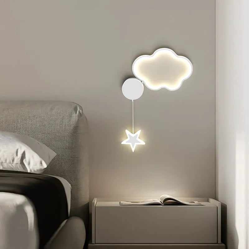 Cartoon cloud, moon and five-pointed star shaped bedside wall lamp for a children's bedroom in black or white.