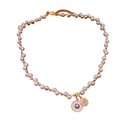 Gold electroplated zircon pearl pendant necklace on adjustable clavicle chain
