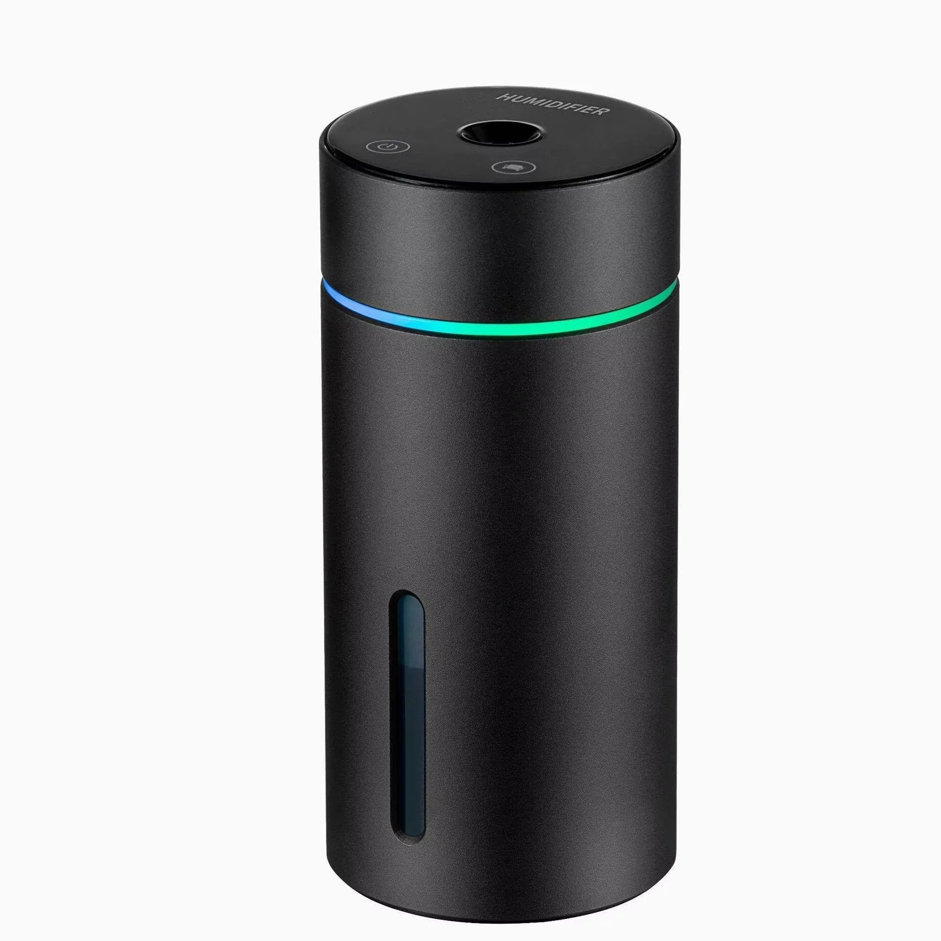 Compact aluminium car humidifier and essential oil diffuser with night light on a desk.