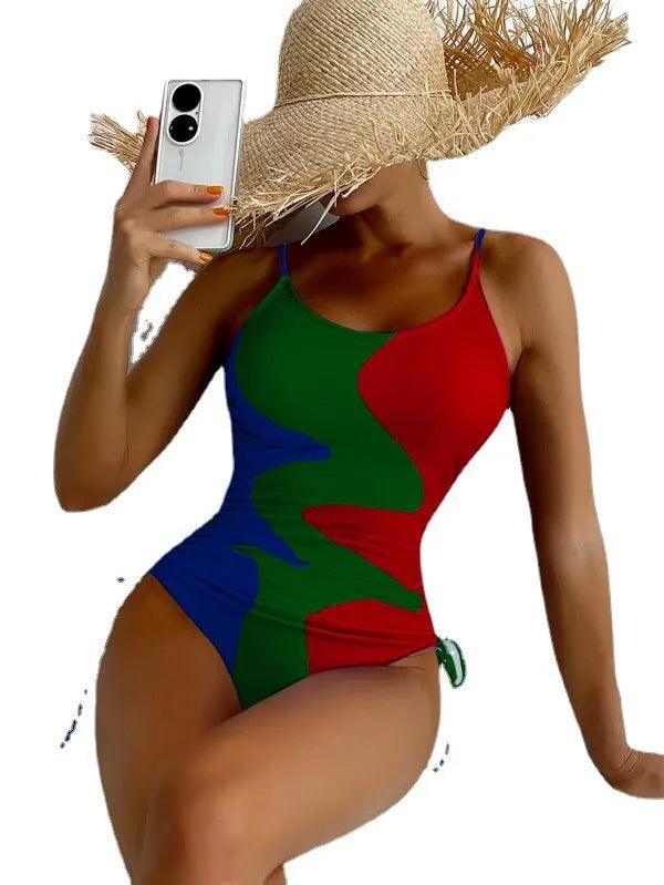 Women's blue sleeveless one-piece swimsuit with a striped pattern on a mannequin.