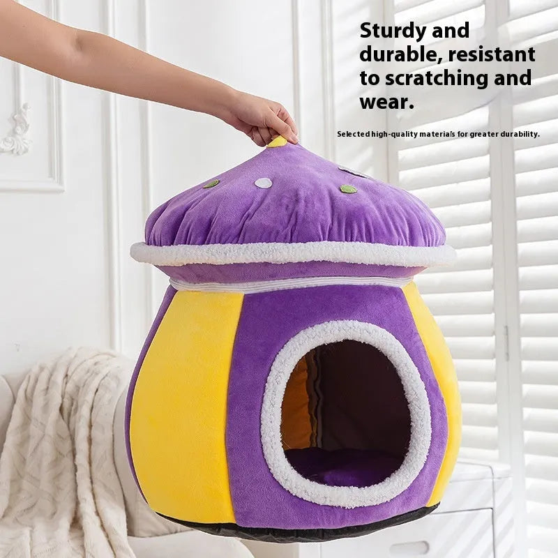 Purple mushroom-shaped cat bed with detachable top blanket on grey carpet