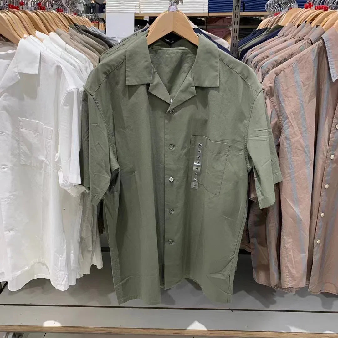 Man wearing a beige open collar modal cotton blend casual shirt in a cardigan style
