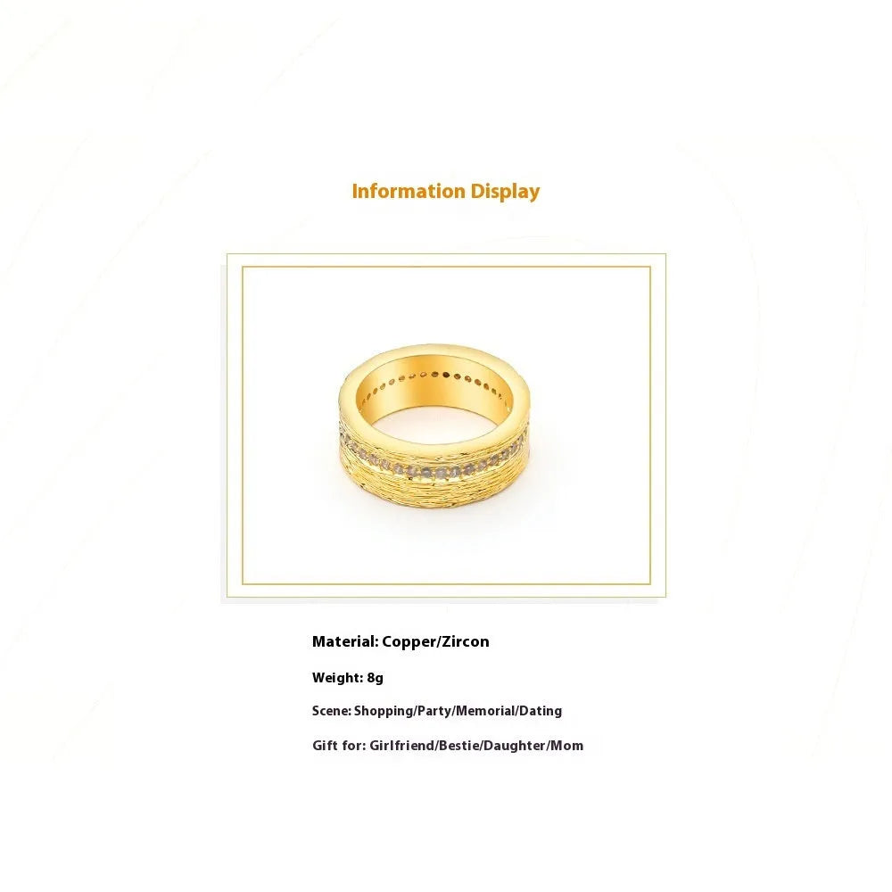 Gold geometric zircon ring for women on a white background.