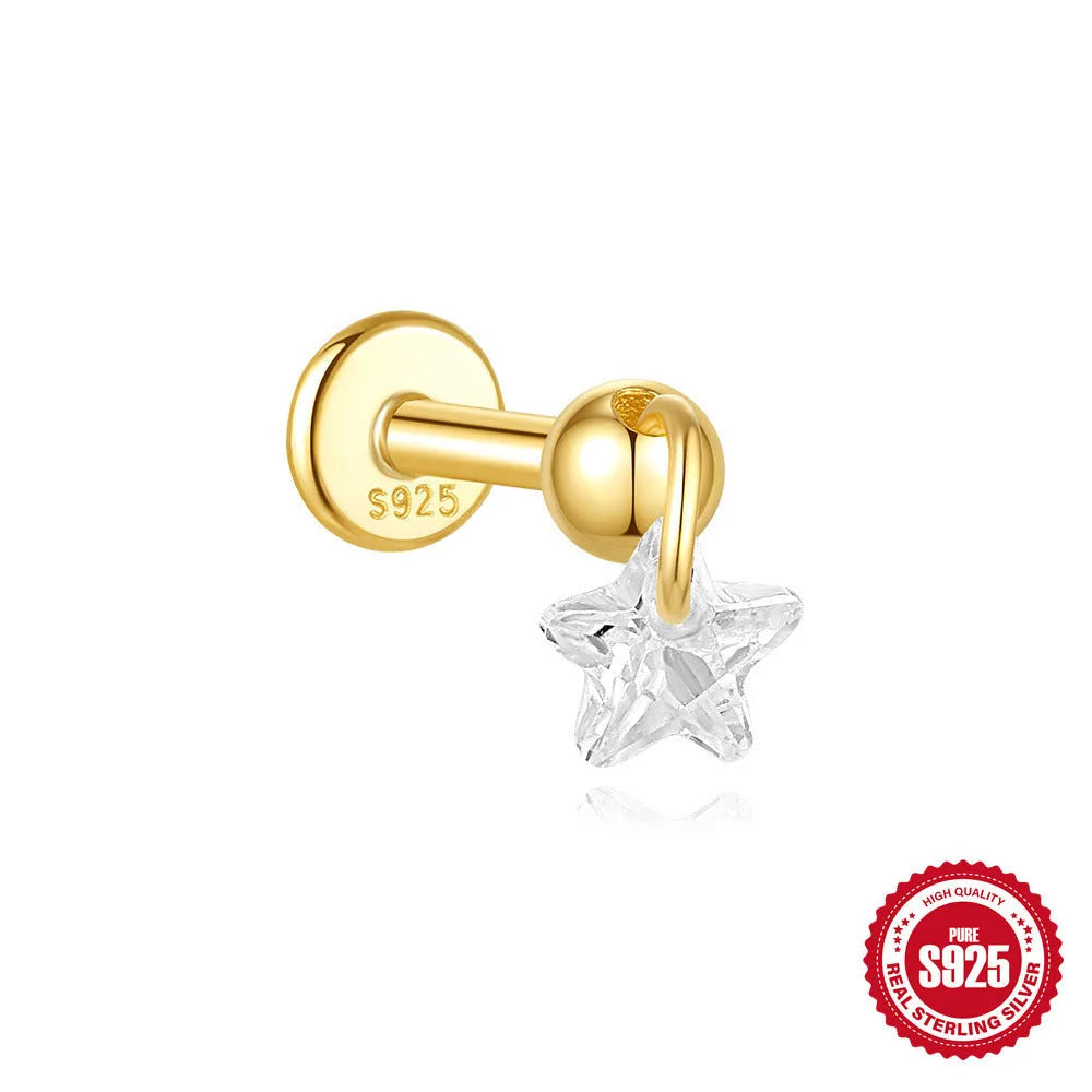 S925 sterling silver geometric moon and star earrings with diamond detail in a gold colour.