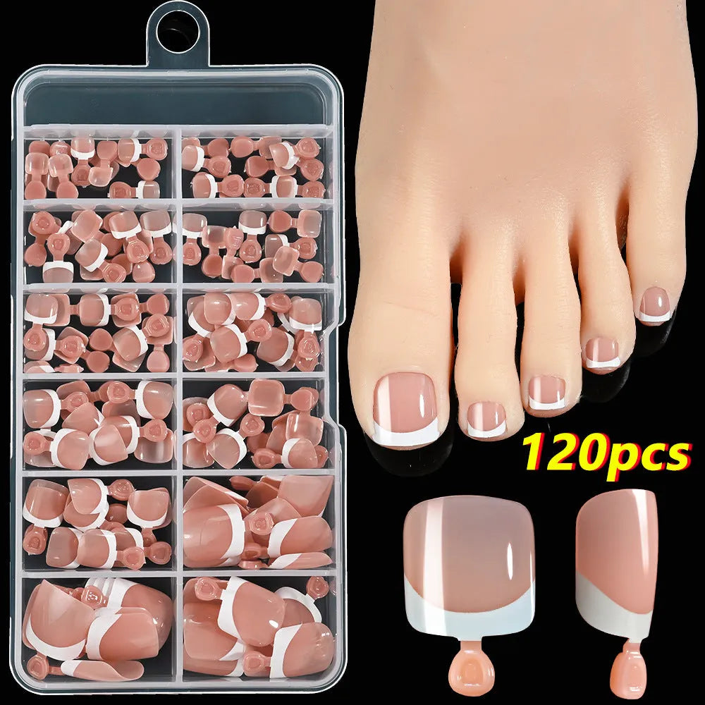 Box of 120 French white edge nude full square short artificial nail pieces showing nine colour shades