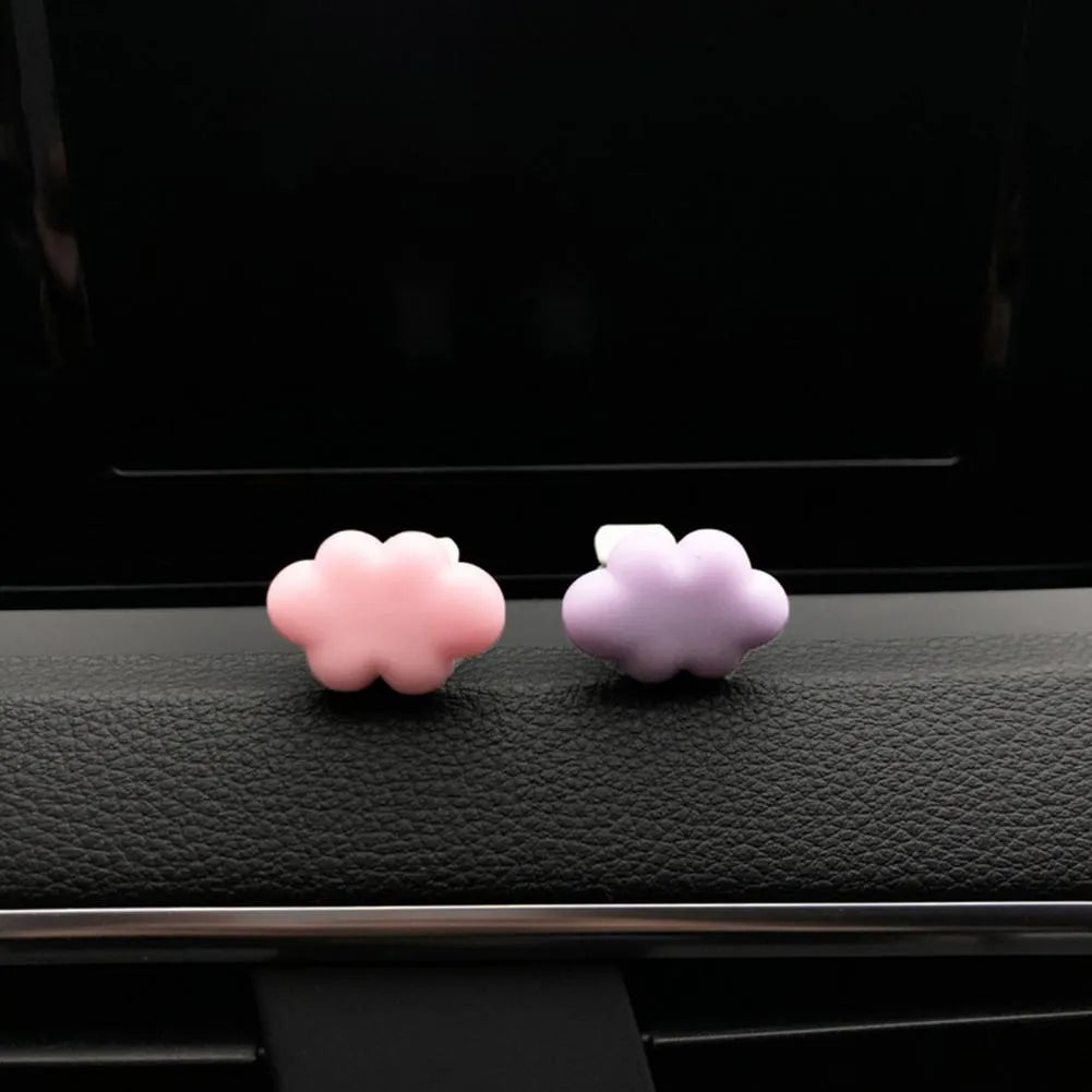 Resin cartoon car fragrance clip in light green colour mounted on car air vent