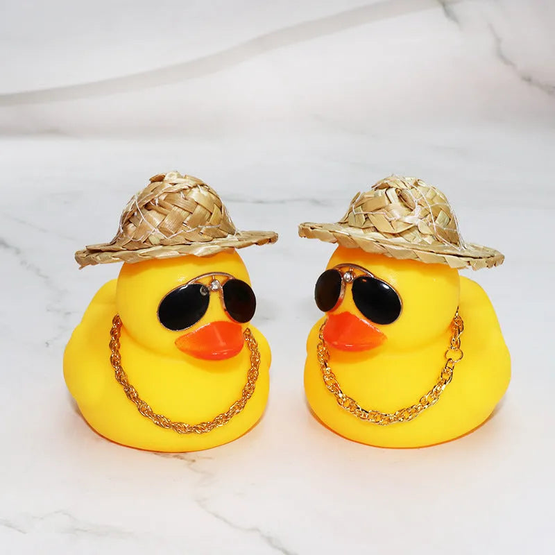 Straw hat yellow duck cartoon character car ornament with plastic alloy construction and accessory necklace
