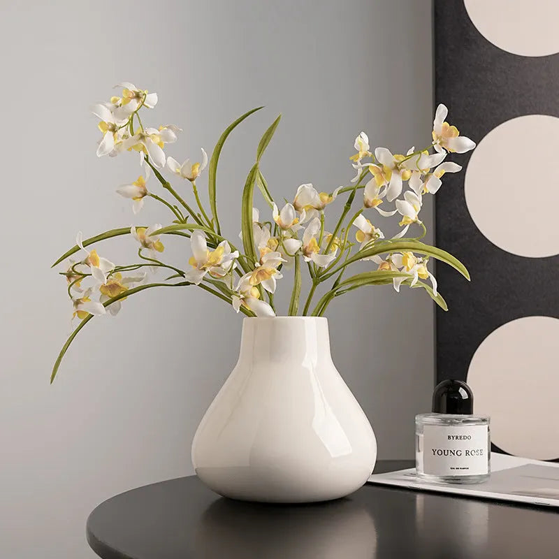 Ceramic decorative vase with glass surface in black or white colour with round belly French design