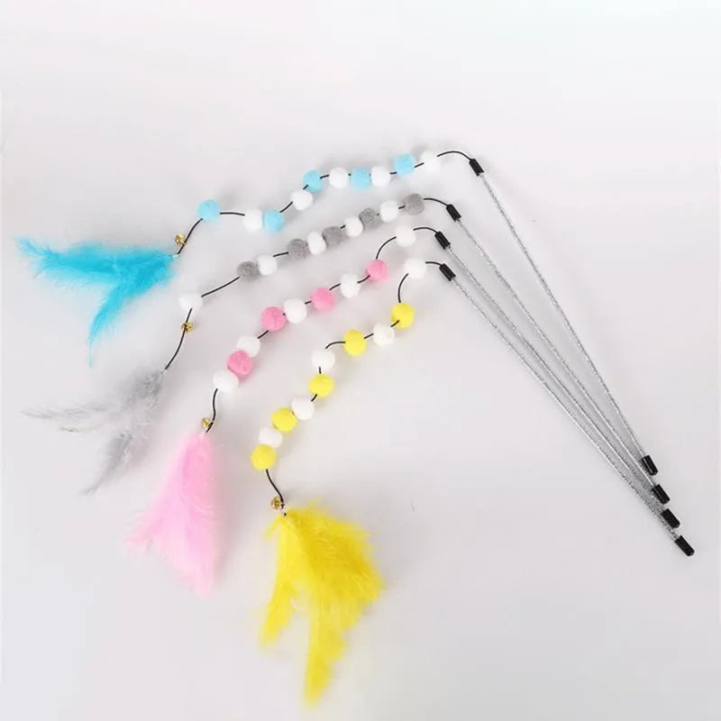 Colourful cat teaser toy stick with acrylic pompon, feathers, and a bell on a 31cm rod
