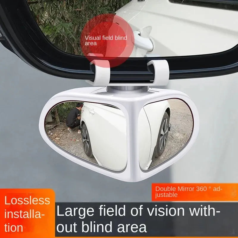 Adjustable wide-angle car reversing mirror on a vehicle, showing black ABS shell.