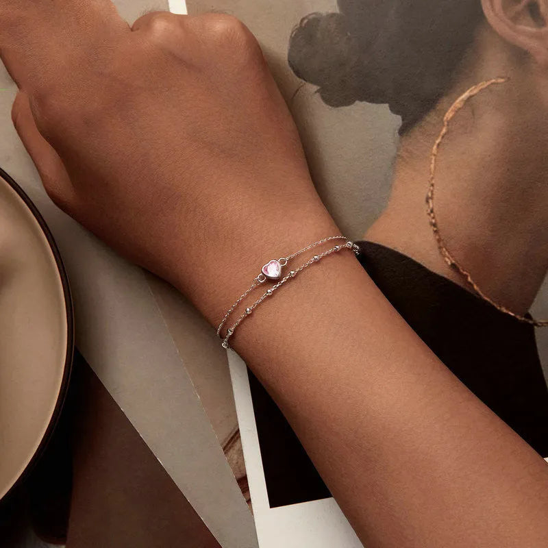 Sweet heart-shaped sterling silver bracelet with adjustable chain
