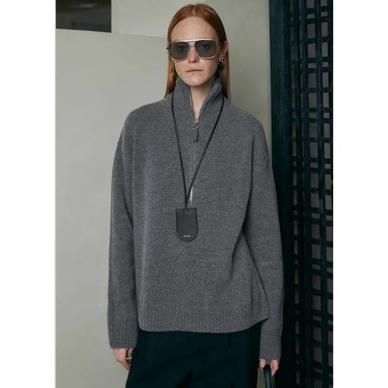Women's wool bandage top with loose lapels in black or mountain rain grey, long sleeve pullover