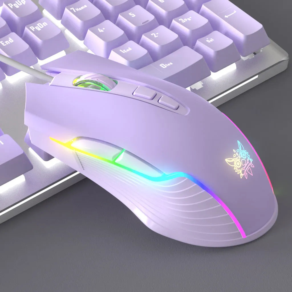 Purple and white wired mechanical keyboard and mouse combo set on a desk.