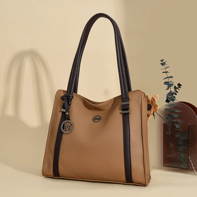 Women's large horizontal square PU leather crossbody bag in wine red colour.