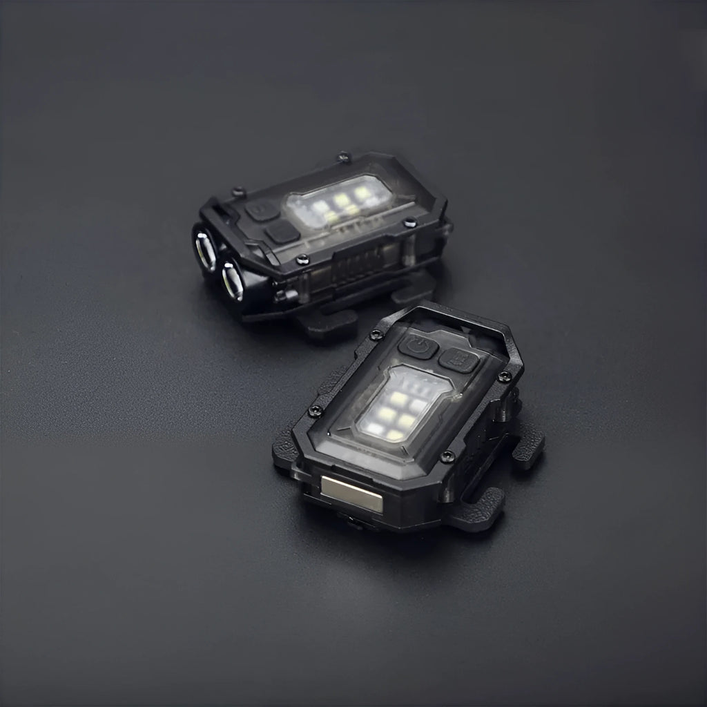 Portable tactical mini warning flashlight with a black housing, showing the LED lens, a side mounting clip, and an included USB charging cable.
