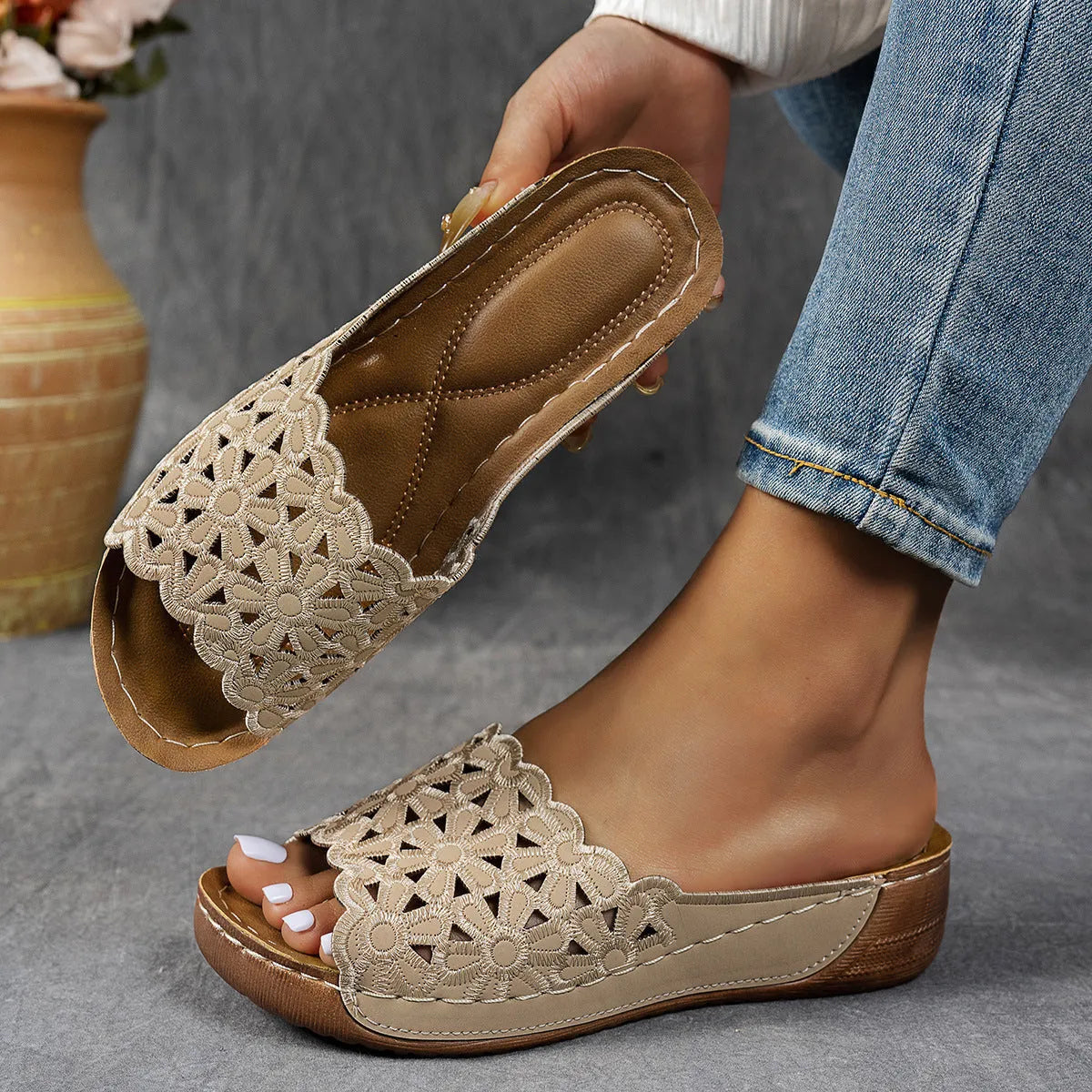 Women's wedge beach slippers with flower cutout detail and fish mouth toe shape in light brown