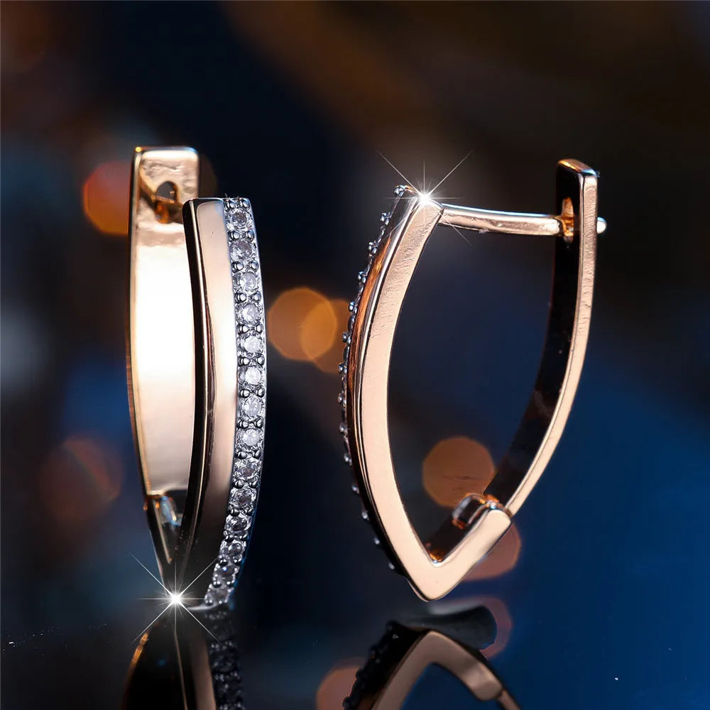 Women's geometric V-shaped ear clips with champagne gold electroplating and white diamond accents