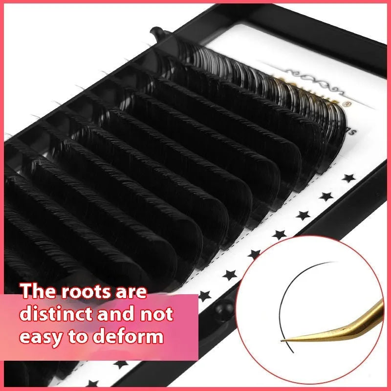 Dense 16-row mink hair false eyelashes on a white background, showing natural fibre texture.