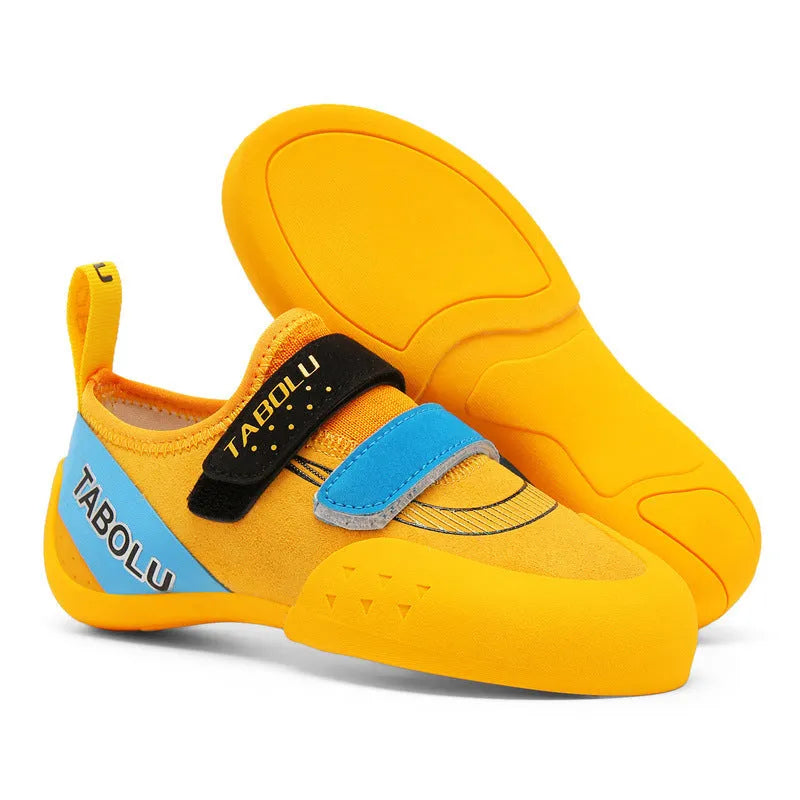 Beginner unisex rock climbing shoes with Velcro strap in black and red colour option.
