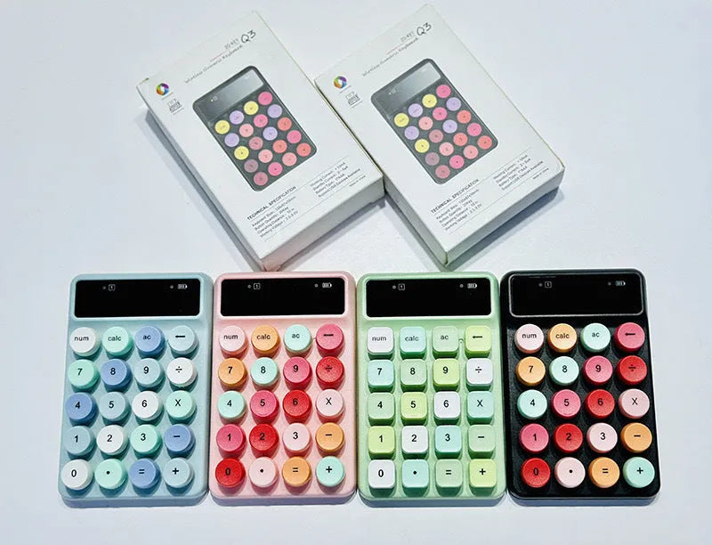 Mini portable wireless keyboard in macaron mixed colours on a desk.