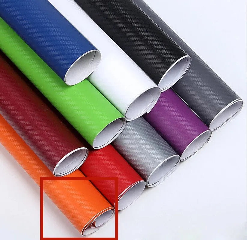 Roll of black 3D carbon fibre texture adhesive sticker for car decoration, showing textured pattern.