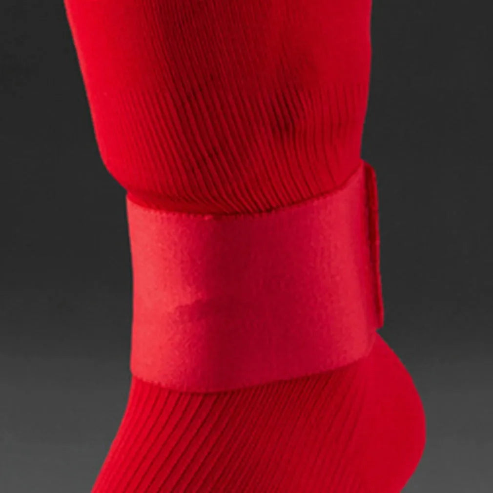 Rubber football shin guard tape belt showing black, blue, red, and white colour options with 25x6.5cm dimensions.
