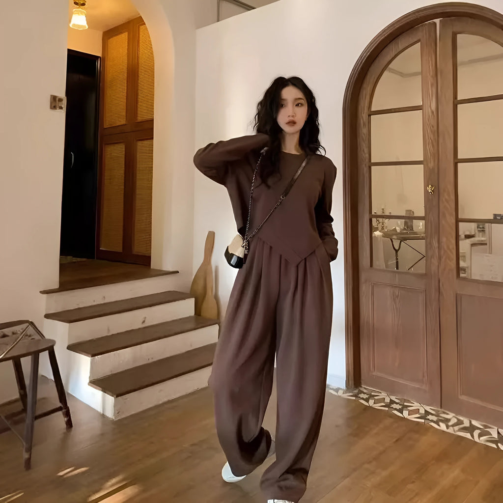 Women's khaki casual sports suit with loose-fit long sleeve top and matching trousers.