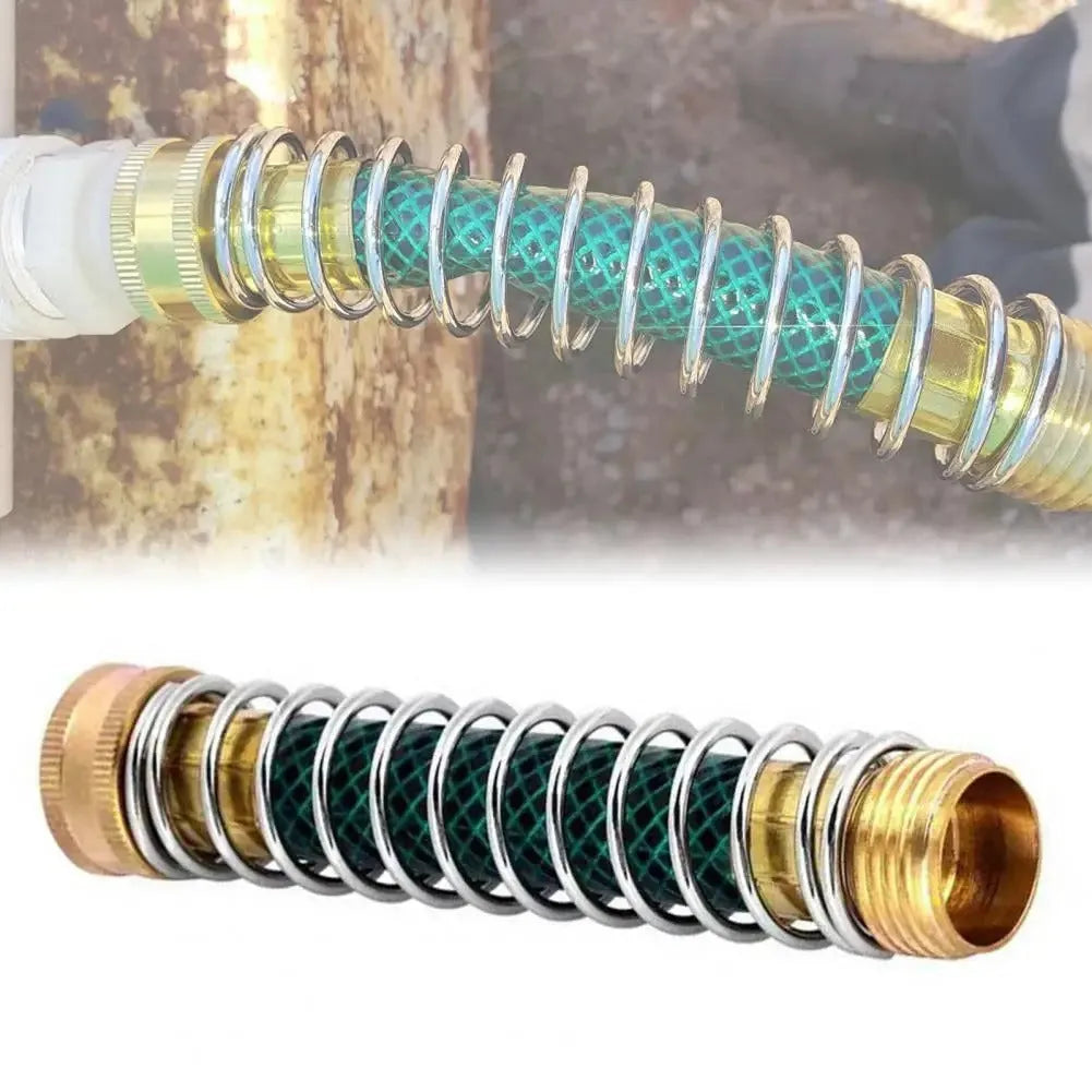 Brass garden hose connector with internal spiral spring, 15cm long with 3/4 inch threaded ends.