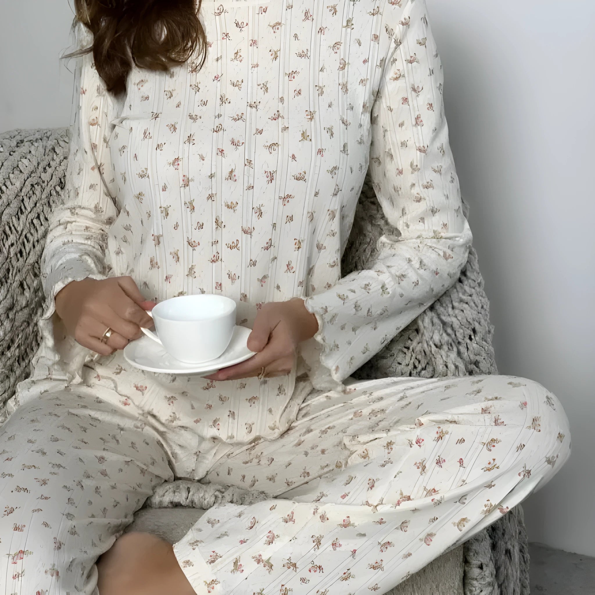 Women's white floral print pyjama suit with bell sleeve top and wide leg trousers
