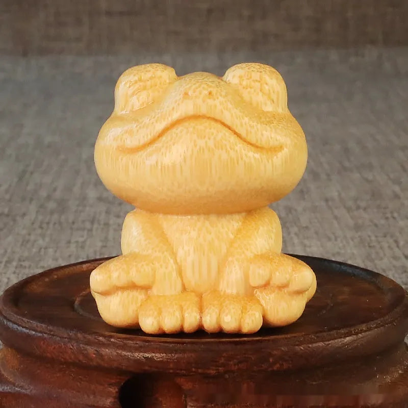 Solid bamboo smiling frog carving ornament measuring 5cm height for decorative gifts
