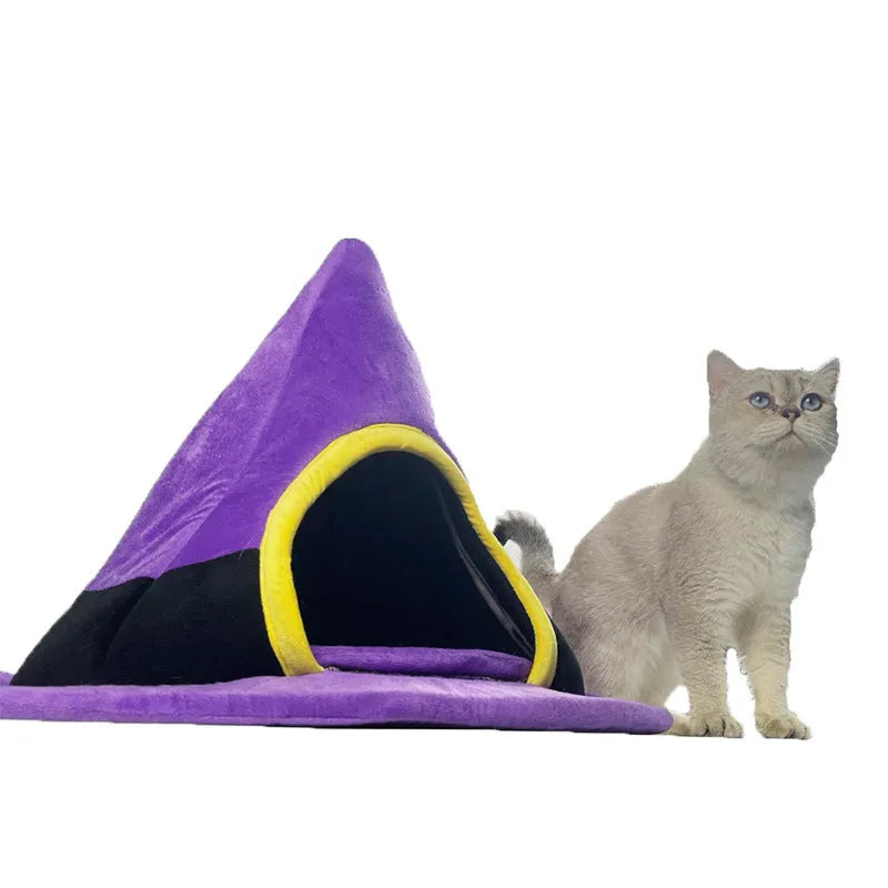 Purple Halloween witch hat shaped cloth cat bed measuring 60 by 45 centimetres