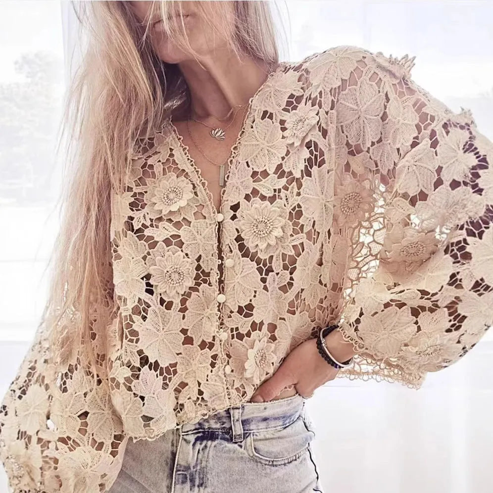 Black lace cardigan shirt with 3D floral embroidery and a V-neck, shown on a hanger.