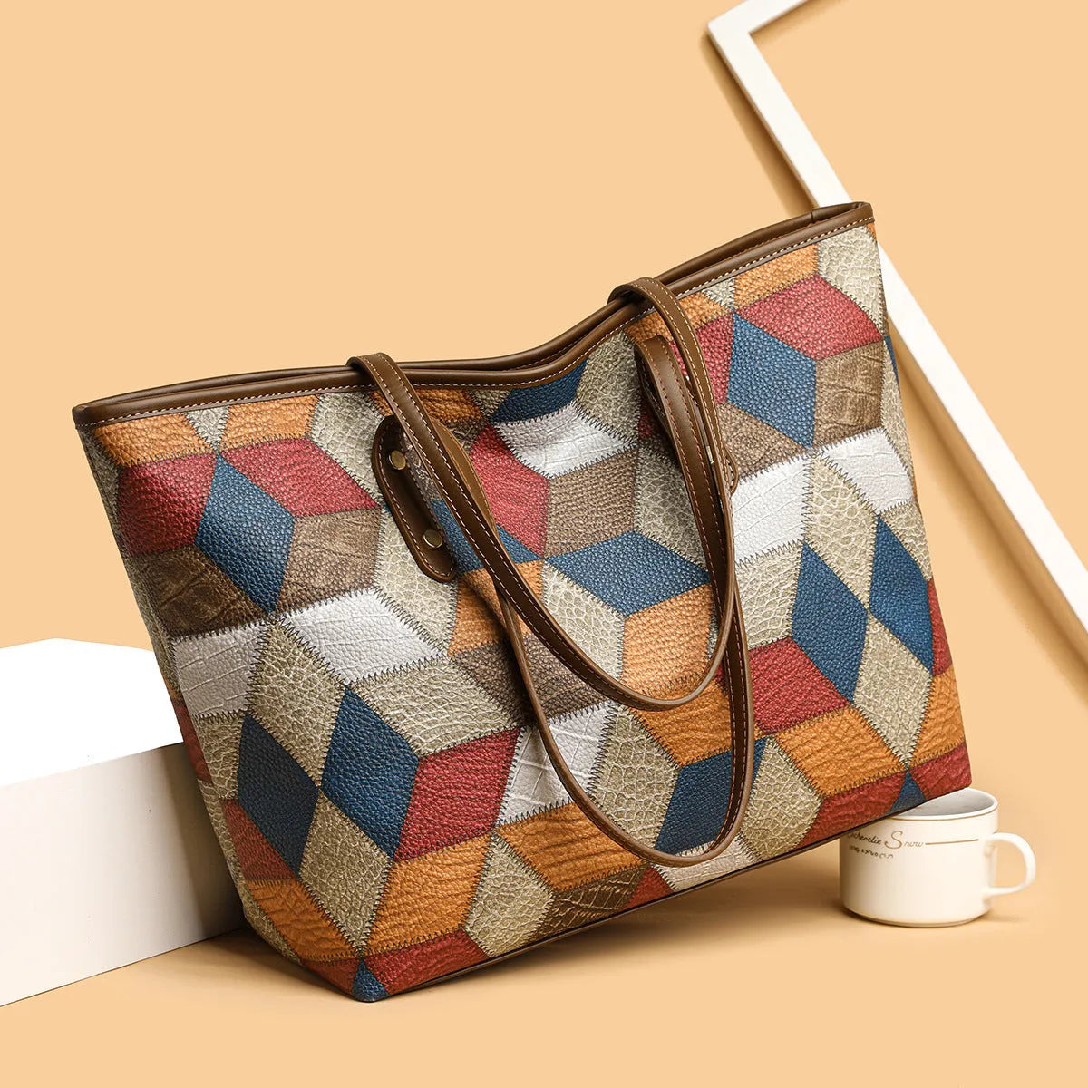 Women's large capacity PVC shoulder handbag in blue brown colour with sandwich pocket design