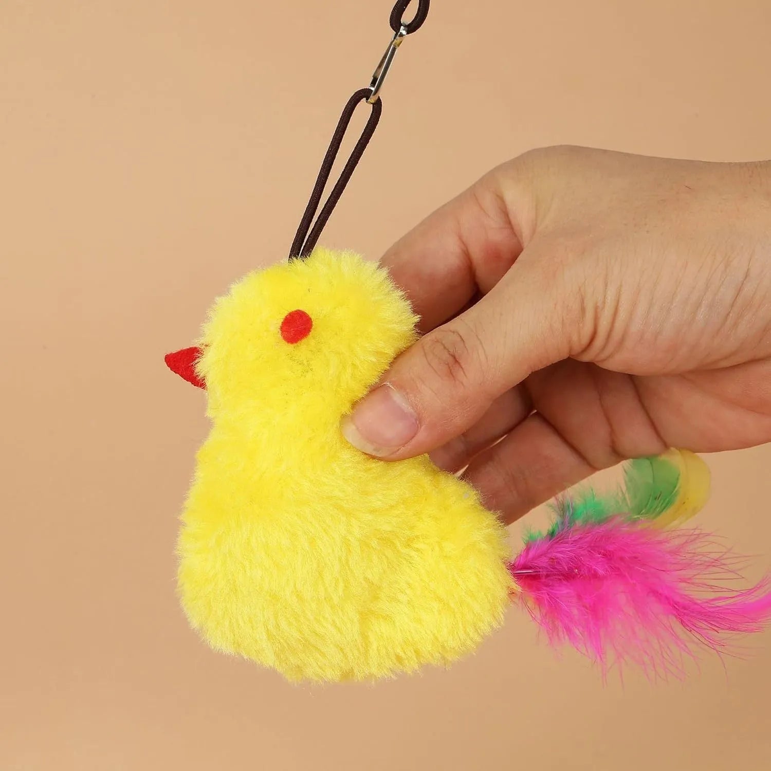 Interactive hanging cat toy with swinging mouse and chicken attachments, treat bulb, and retractable elastic rope