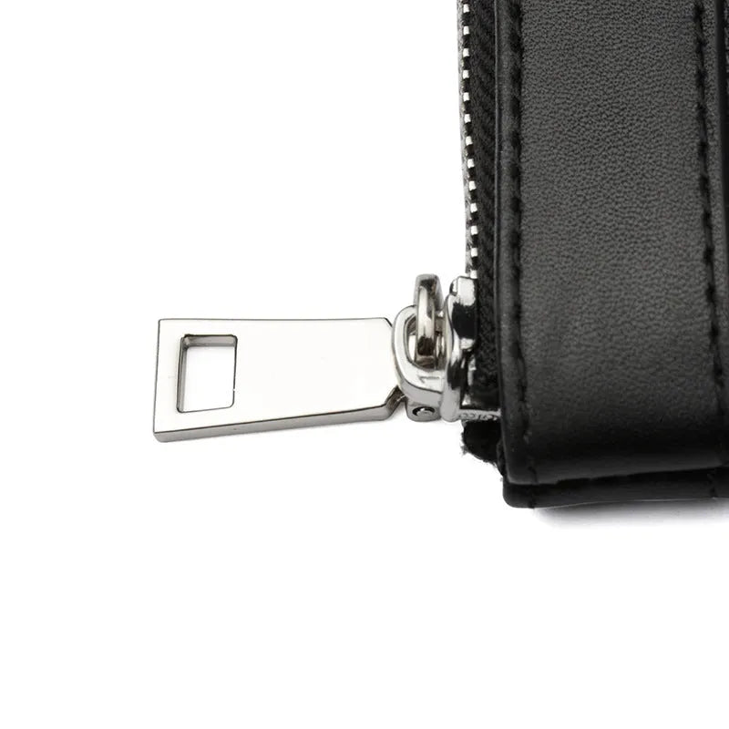 Black leather plaid men's wallet showing cowhide texture and compact 20cm size