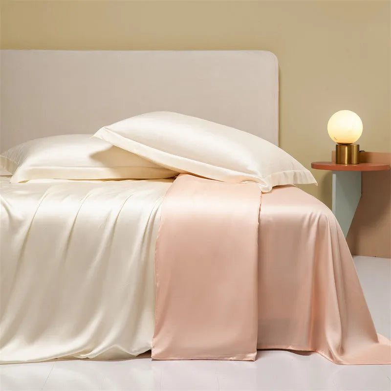 Four-piece Lenzing Tencel quilt sheet set in Antique White showing quilt cover and pillowcases with modern simple style