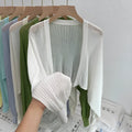 Hollow-out long sleeve blouse with lantern sleeves in apricot colour