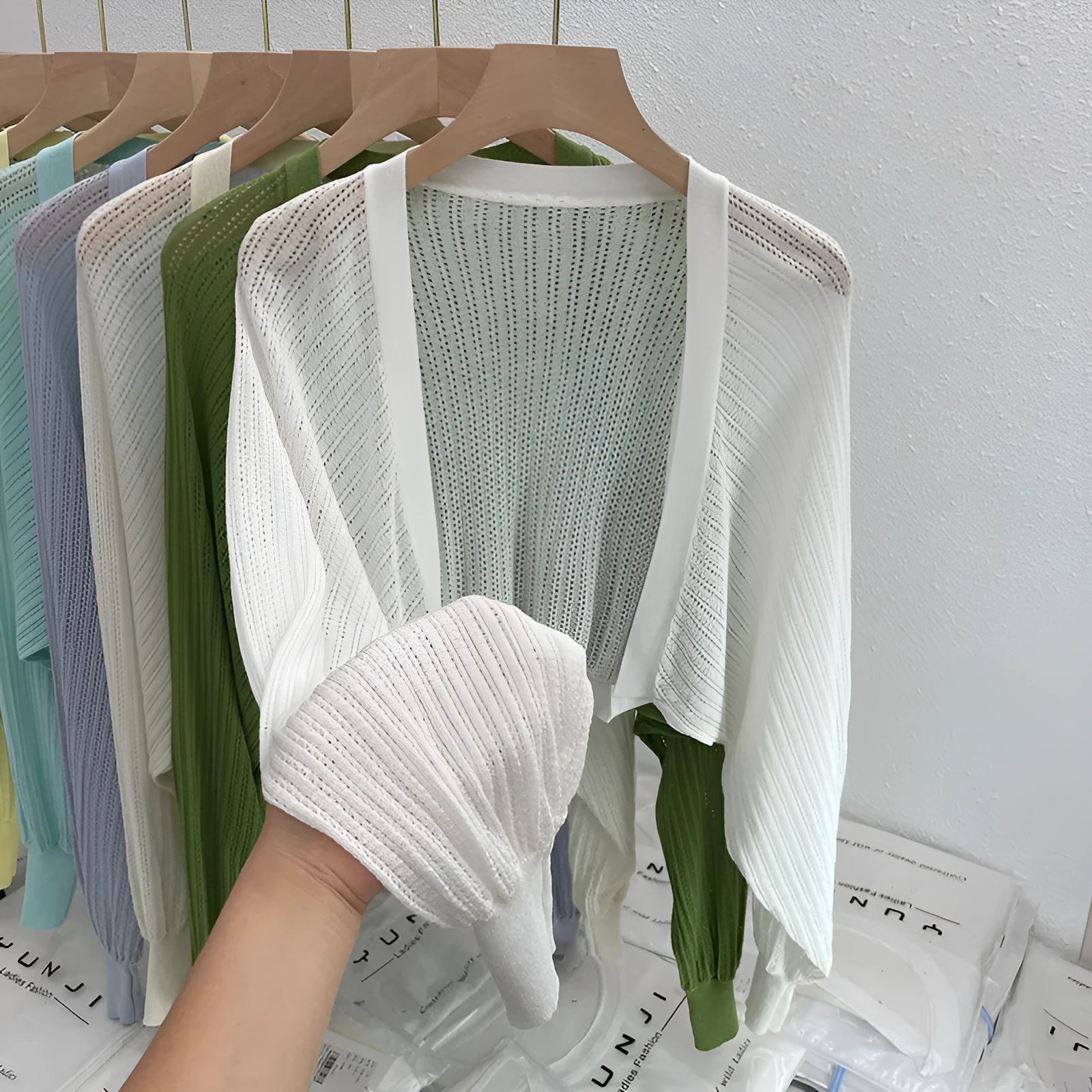Hollow-out long sleeve blouse with lantern sleeves in apricot colour