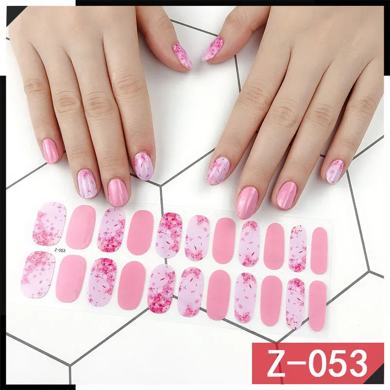 Korean nail stickers pack showing cartoon, floral, and embossed designs with a nail file.