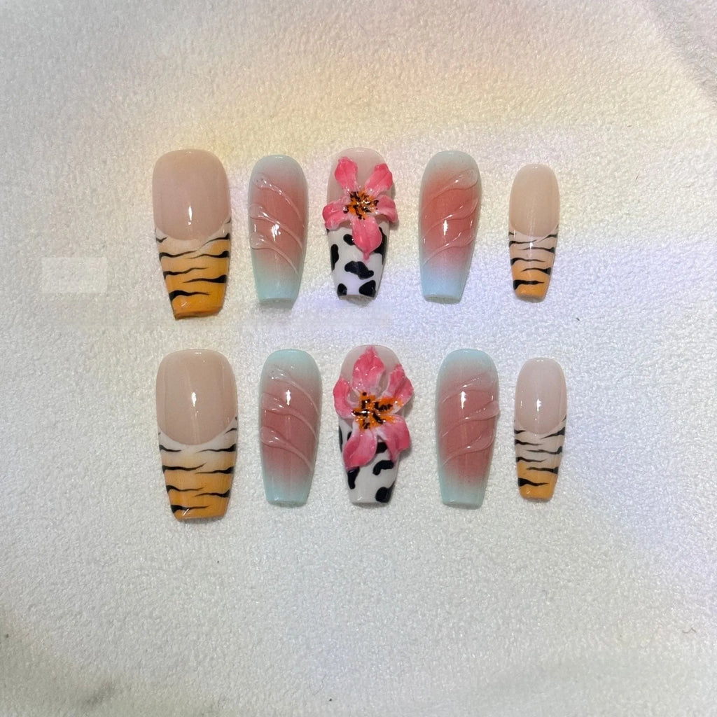 Zebra pattern lily hand carving nail art set showing embossed floral and leopard print designs