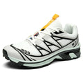 Men's and women's low-top black and grey hiking shoes with rubber sole and lace-up front.