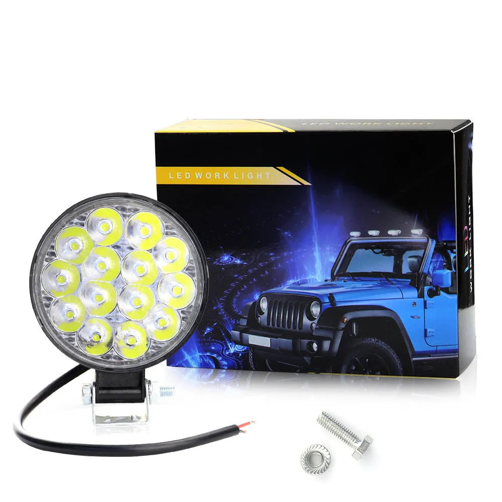 White aluminium mini round 42W LED work light with IP67 waterproof rating for vehicles and machinery.