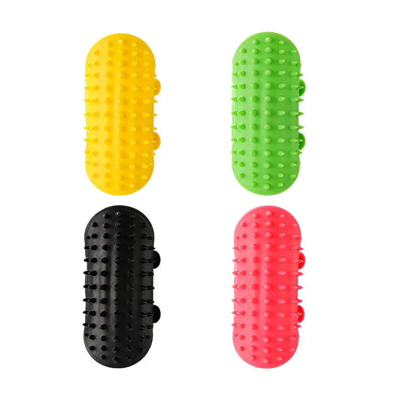 Silicone wall-mounted cat grooming brush with comb teeth and adjustable strap for table legs.